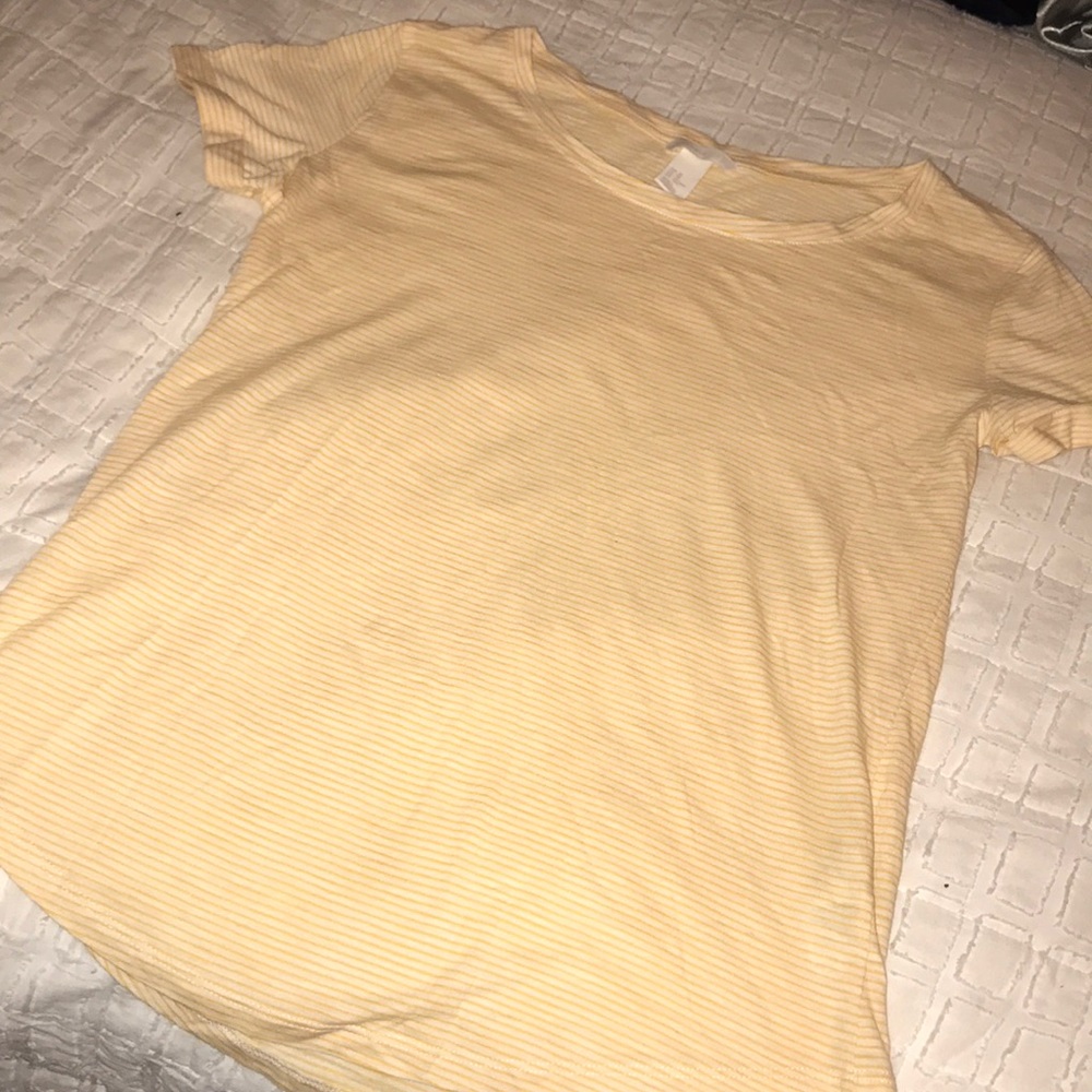 Pale yellow, striped shirt with cuffed sleeves